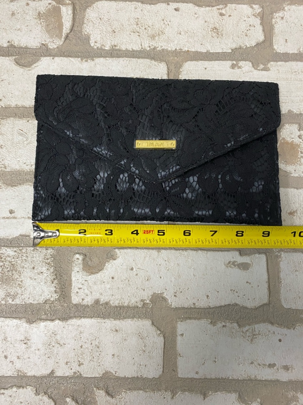 IMAN Black Lace Envelope Clutch with Gold Tone Logo Plate